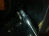 steering cable w half moons and rubber washer.jpg
